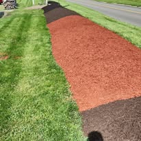 Red mulch installed in a landscape bed